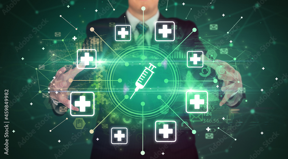 Fototapeta premium Hand holding healthcare icons concept