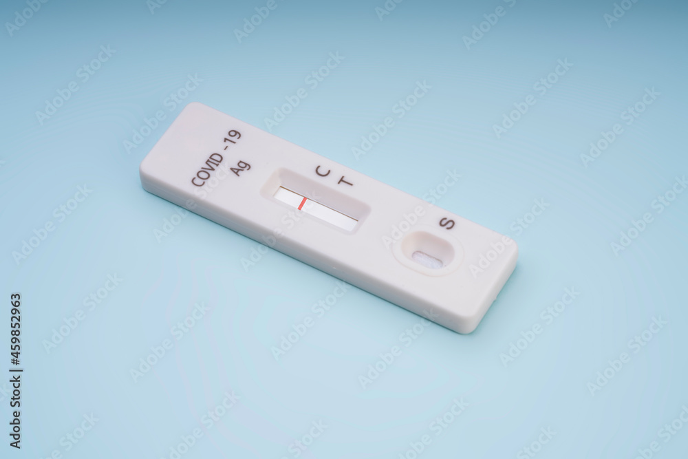 Covid-19 Antigen Rapid test kits on white background. Test results result is negative. Covid-19 Antigen Rapid test kits on white background. Test results result is negative.