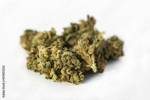 Marijuana pieces on isolated white background