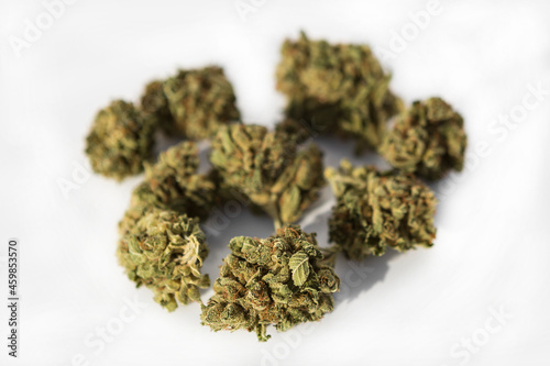Marijuana pieces on isolated white background