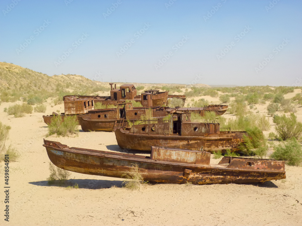 Old rusty boats on the Aral Sea, Uzbekistan Old rusty boats on the Aral Sea, Uzbekistan