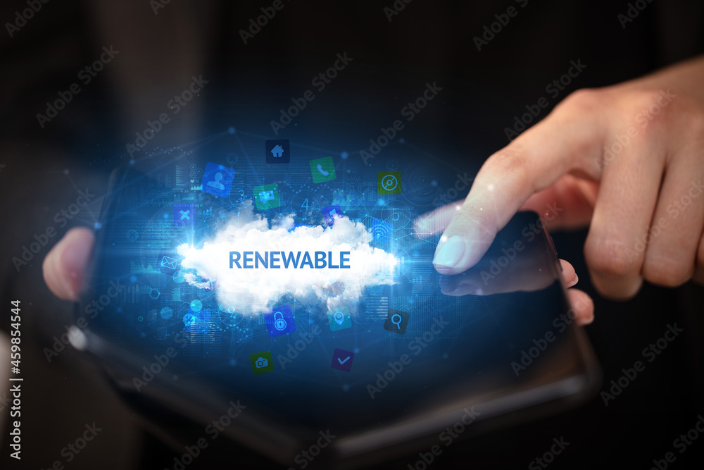 Businessman holding a foldable smartphone, technology concept Businessman holding a foldable smartphone, technology concept