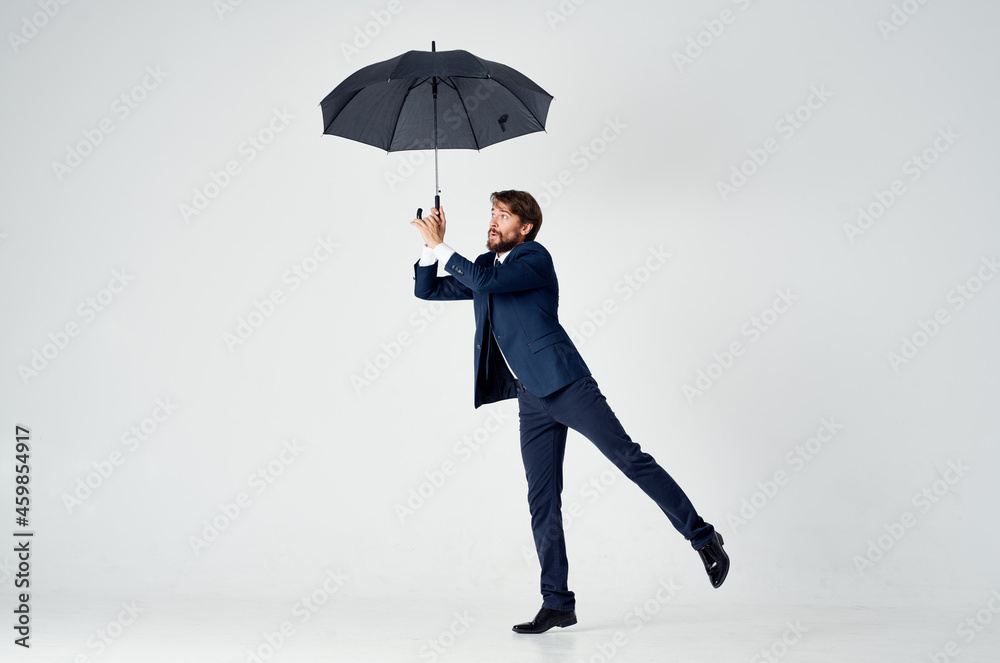 business man in suit umbrella protection self-confidence studio business man in suit umbrella protection self-confidence studio