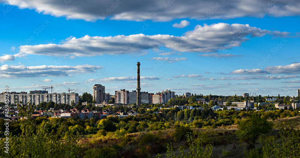 panorama of the city on the outskirts. nature and industry.