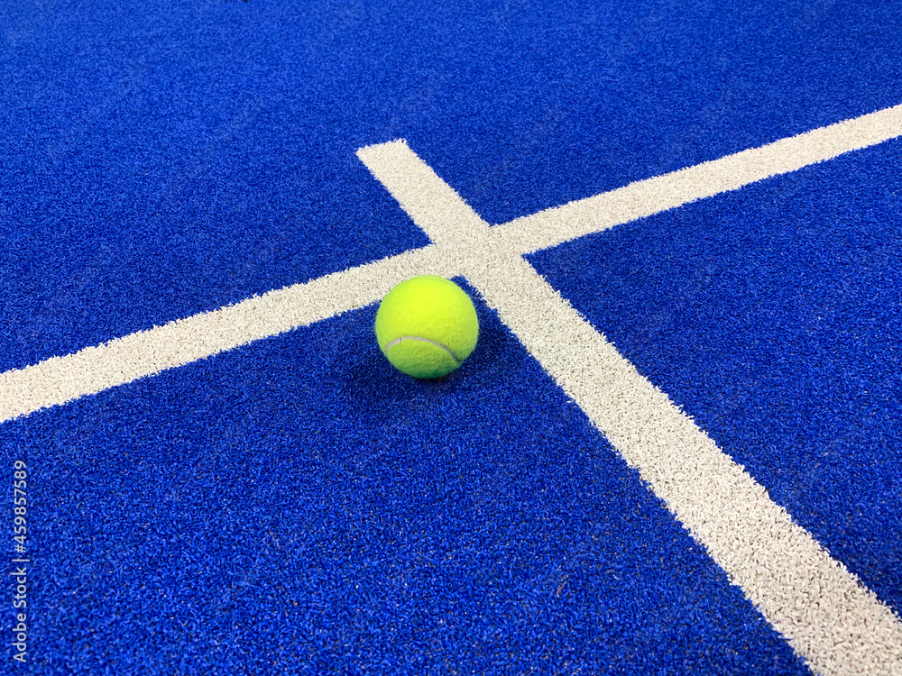 Padel ball on padel court.