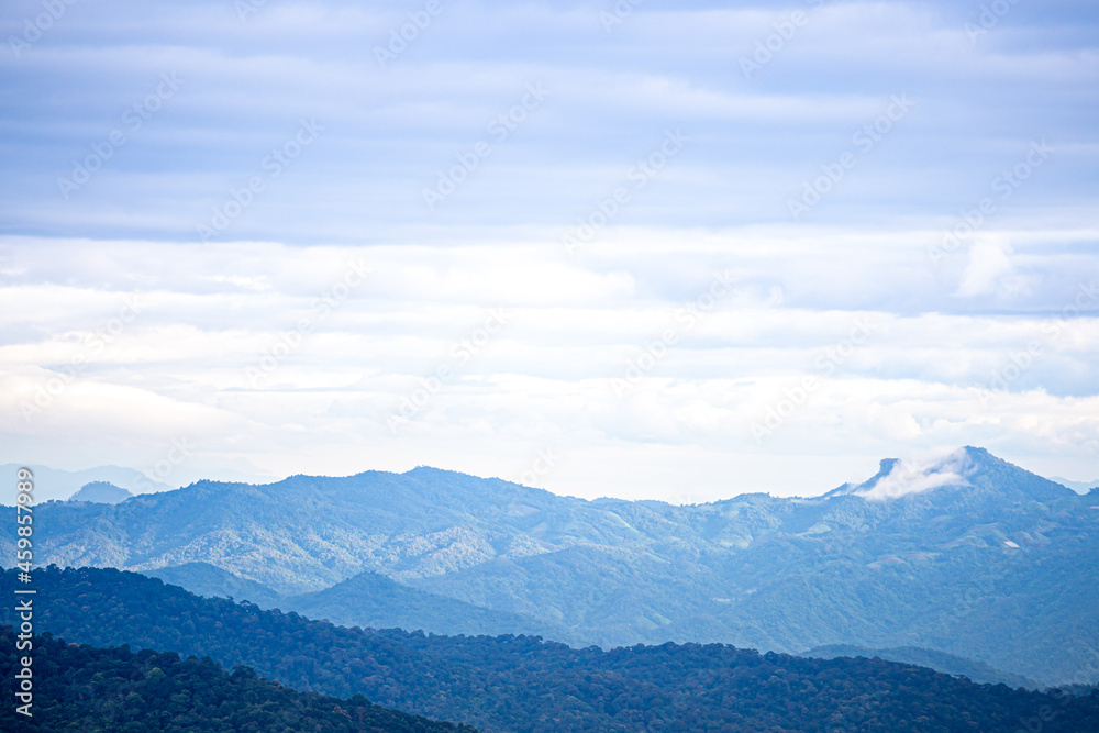 View of high hills and big clouds in the blue sky on Doi Mon Chaem, Chiang Mai, Thailand. View of high hills and big clouds in the blue sky on Doi Mon Chaem, Chiang Mai, Thailand.