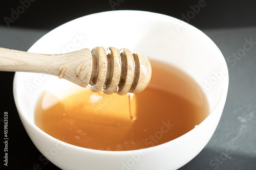Wooden spoon honey. Honey jar. 