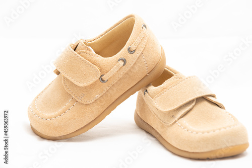 kid shoes in white background for online shop