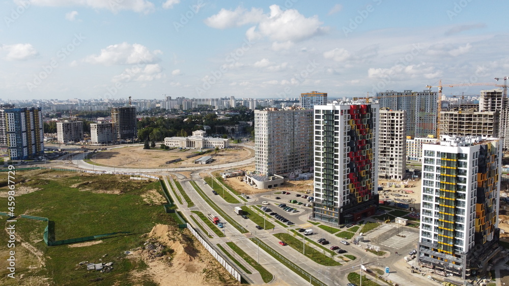 Top view of the construction of a new district of the city quarter with residential buildings and business centers. 25 September 2021, Minsk, Belarus