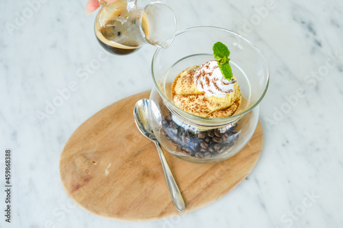 Affogato coffee with vanilla Ice Cream on table