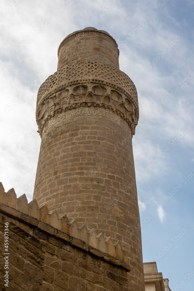 Facade and minaret of the Muhammad Mosque in the old city of Baku, Azerbaijan