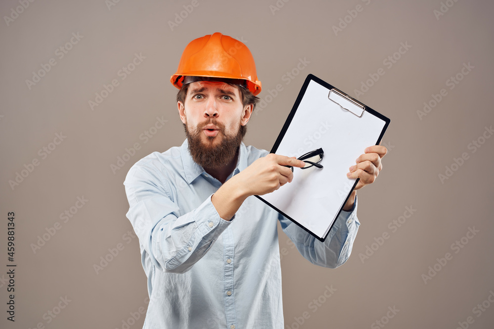 bearded man work in the construction industry protective uniform