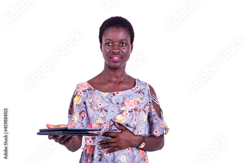 portrait of a beautiful businesswoman with tablet, smiling.