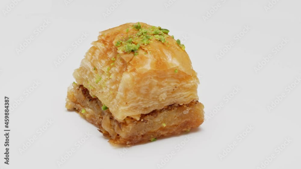 Baklava dessert on isolated rotating white background Baklava dessert on isolated rotating white background
