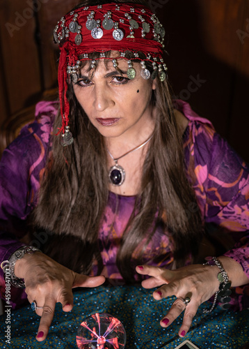 Εκτύπωση καμβά Psychic readings and clairvoyance concept: a fortune teller uses a crystal ball to predict the future