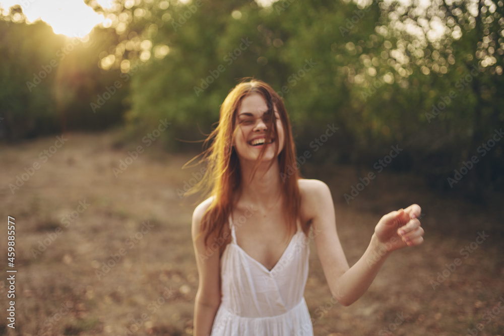 cheerful woman outdoors in the field freedom lifestyle cheerful woman outdoors in the field freedom lifestyle