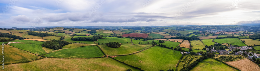 Panorama of fields from drone, Berry Pomeroy Village, Devon, England, Europe