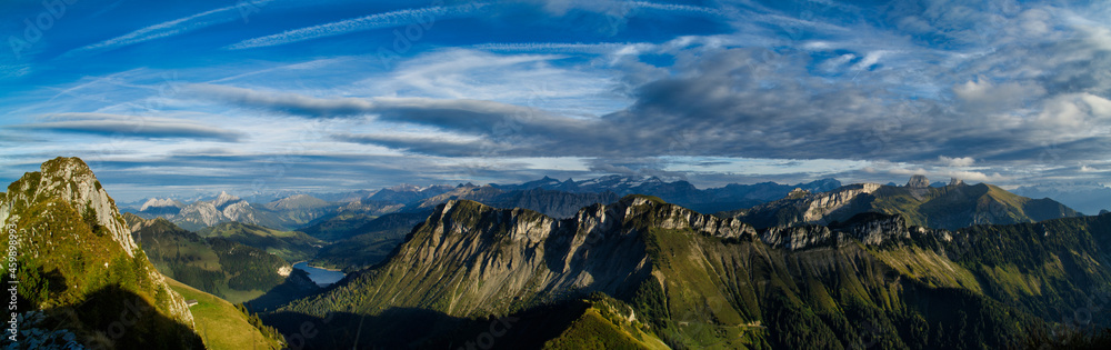 Fototapeta premium Panorama from the mountain Roche de Naye the swiss alps landscape at sunset 