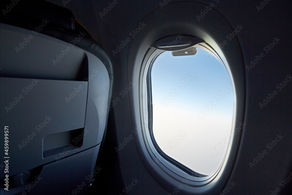 Naklejka premium Close-up airplane cabin window during the journey