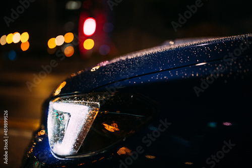 Subaru WRX STi at raining night. photo