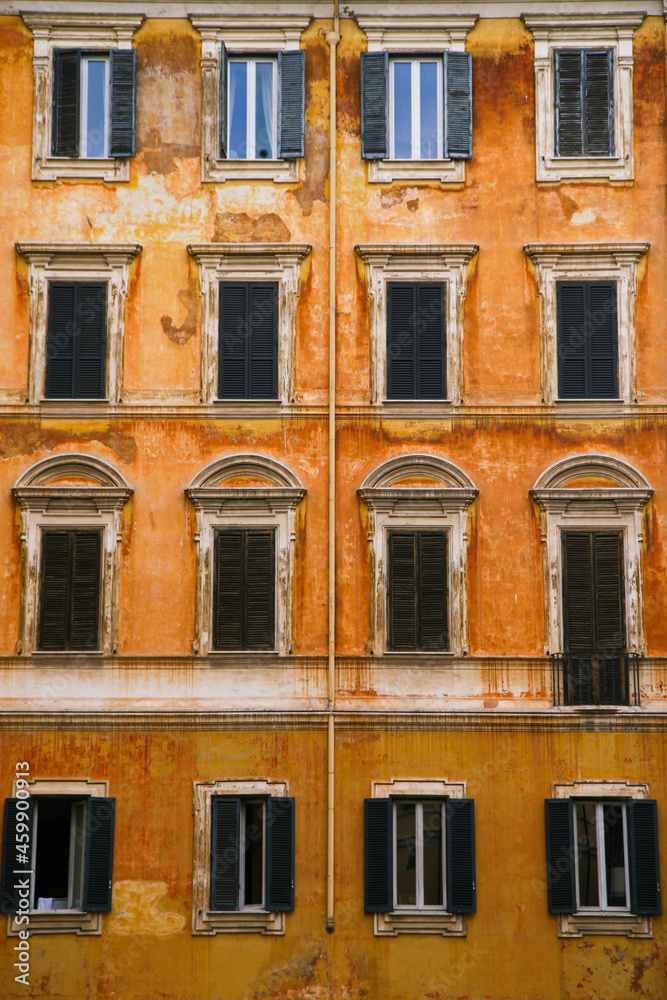 facade of an olg and grunge orange building facade of an olg and grunge orange building