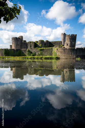 Caerphilly Castle reflected in its moat in south Wales