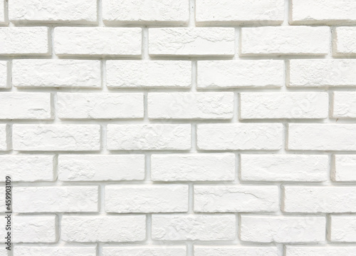 white brick construction wallpaper for exterior and interior design building. rough crack texture of stonewall seamless pattern. seamless modern rectangle grid tile material in brick shape wall