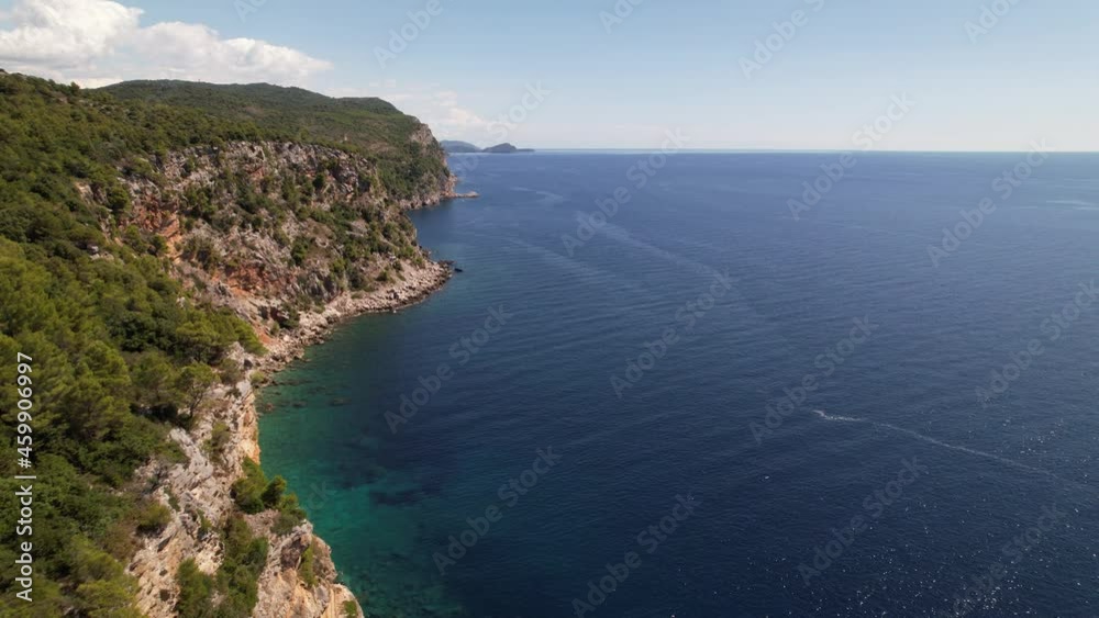 Aerial view of the Pasjaca cliff and beach, blue sea and mountains, Croatia near town Dubrovnik. Dalmatian Coast of Adriatic Sea, Europe. Travel and nature concept Aerial view of the Pasjaca cliff and beach, blue sea and mountains, Croatia near town Dubrovnik. Dalmatian Coast of Adriatic Sea, Europe. Travel and nature concept
