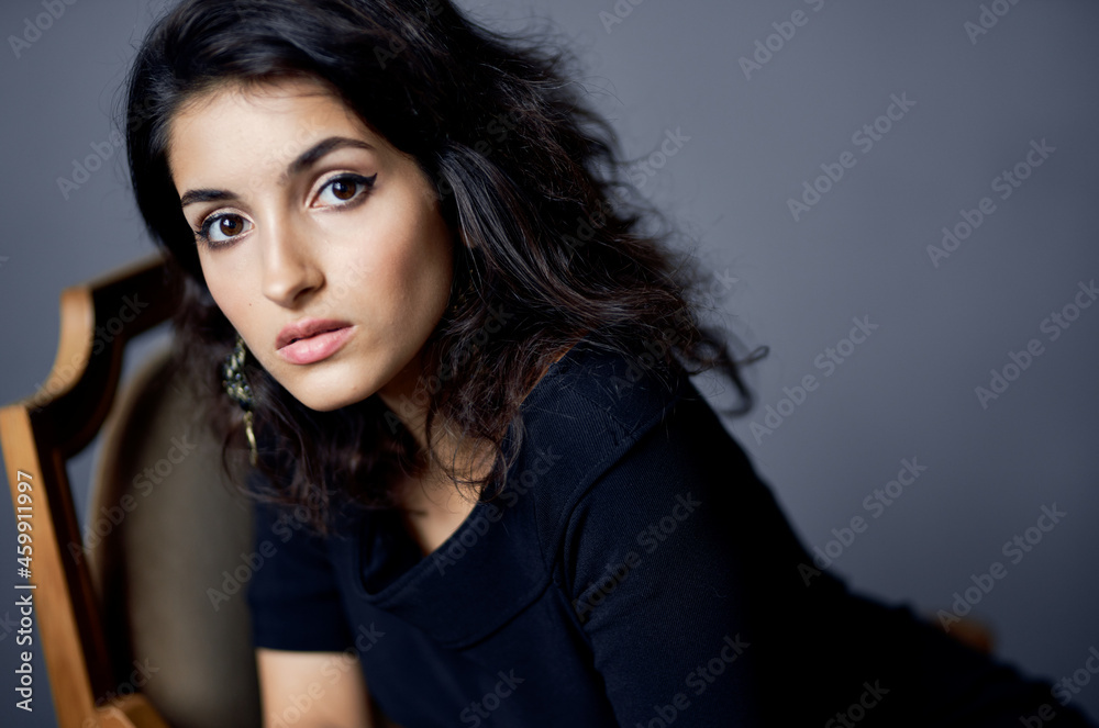 pretty woman in dark dress decoration posing isolated background pretty woman in dark dress decoration posing isolated background