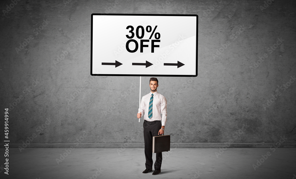 business person holding a traffic sign concept business person holding a traffic sign concept