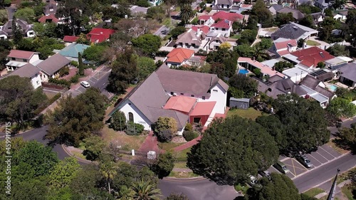 Multi-perspective 4K aerial / drone footage of SASNEV, The South African Centre for the Netherlands and Flanders, also known as the Dutch Library, located in the Garden City of Pinelands, Cape Town.