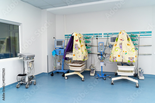 Emergency empty hospital baby ward. Modern interior emergency with nobody in ward. photo