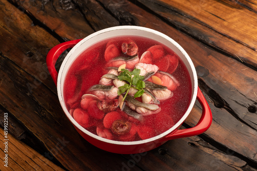 Traditional Chinese banquet dishes, red mushroom pure fish soup photo