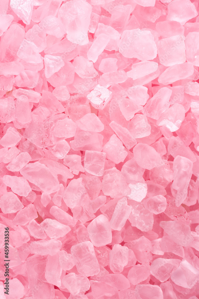 Salt crystals, sea salt as background and texture. Ice crystals pink