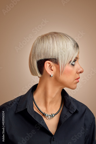 Obraz na plátne Girl with trendy asymmetrical haircut