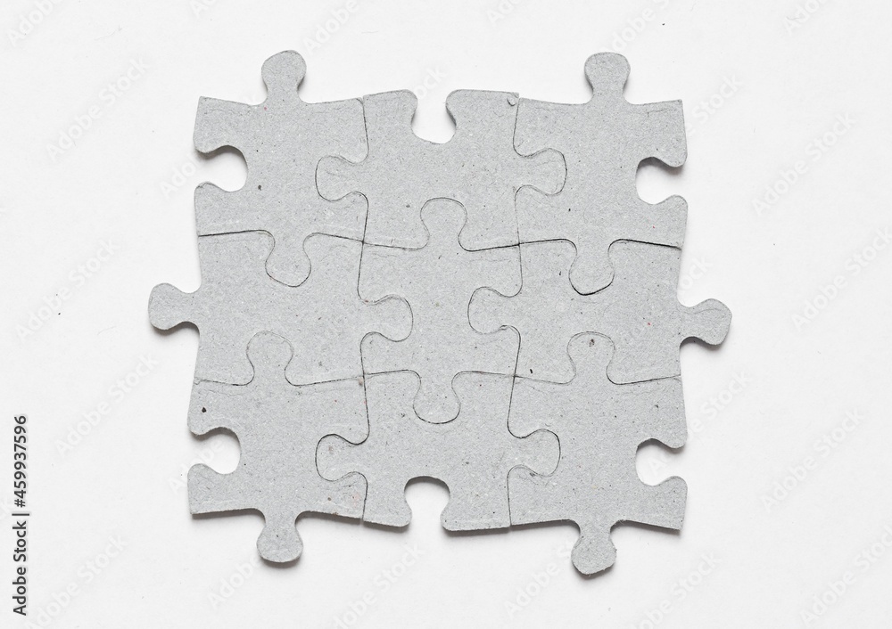 Obraz premium Photo of jigsaw puzzle pieces fit together