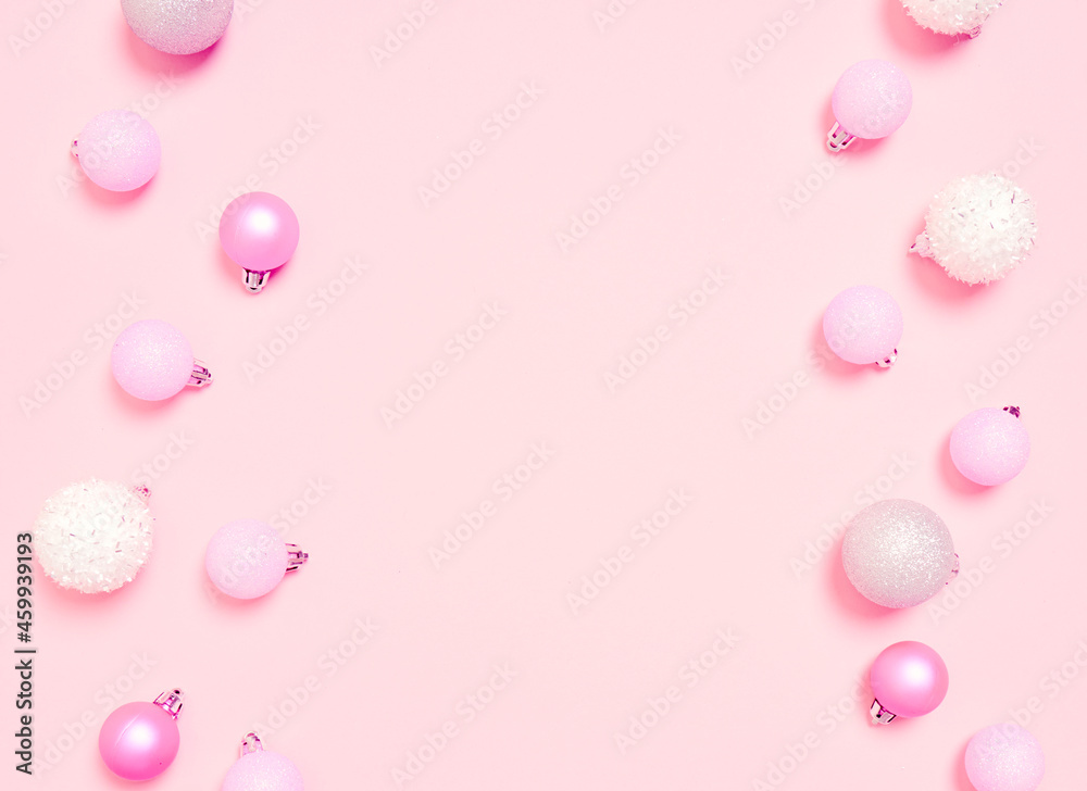 Top view of Christmas composition on pastel pink background. Holiday greeting card with copy space to text.