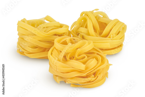Raw tagliatelle pasta isolated on white background with clipping path and full depth of field