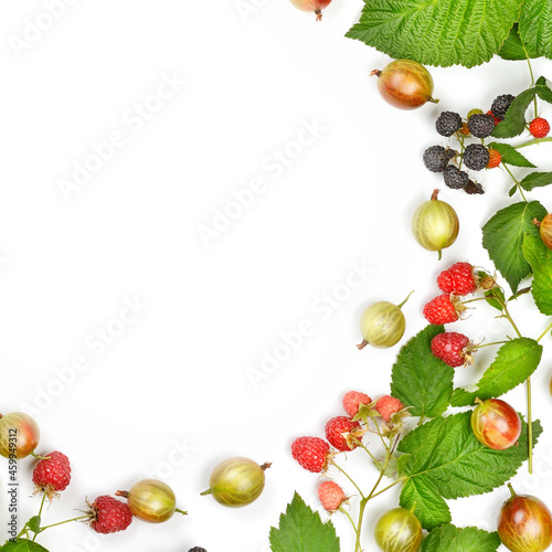 Gooseberries and raspberries isolated on white background. frame with place for text.