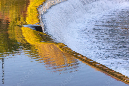 Old Mill dam at Humber River in Autumn, Toronto, Ontario, Canada