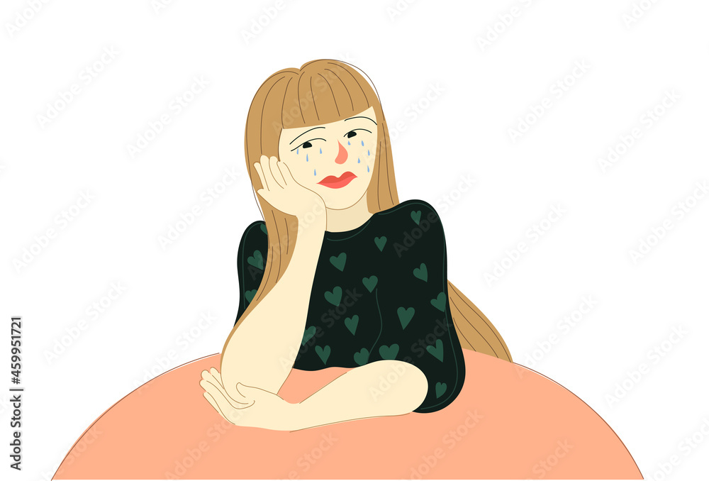 a young girl sits at a table and cries in frustrated feelings a young girl sits at a table and cries in frustrated feelings