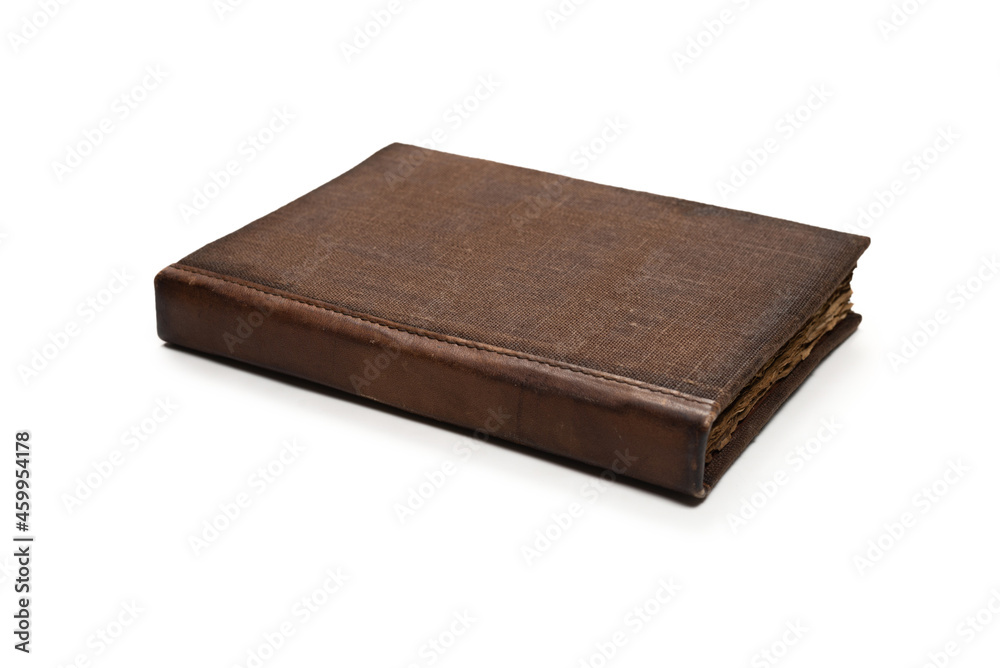 An old brown book isolated on white background. An old brown book isolated on white background.