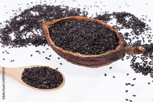 Black organic seeds of sesame - Sesamum indicum.