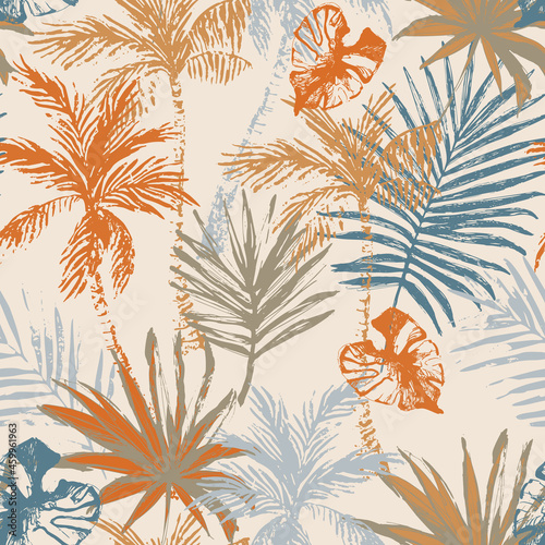 Beautiful abstract tropics seamless pattern. Grunge palm trees, tropical leaves on beige background