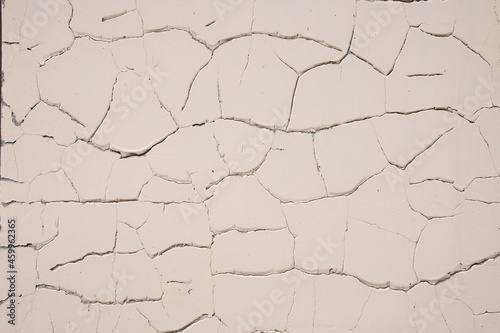Overlay for your design. Background texture of a white cement wall with a crack. A crack in the old wall. High quality photo