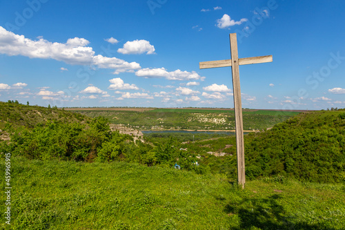 A wooden cross, symbol of Christianity. Saharna, Republic of Moldova.