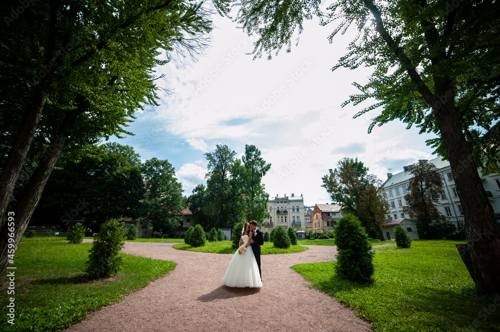 Fototapeta premium Happy bride and groom after wedding ceremony