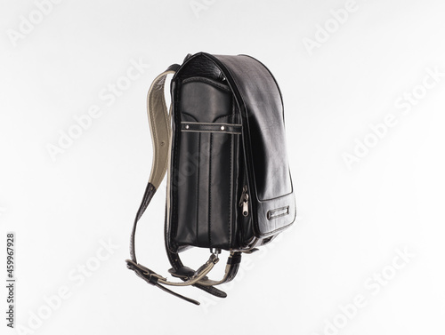 black leather satchel backpack isolated on white background