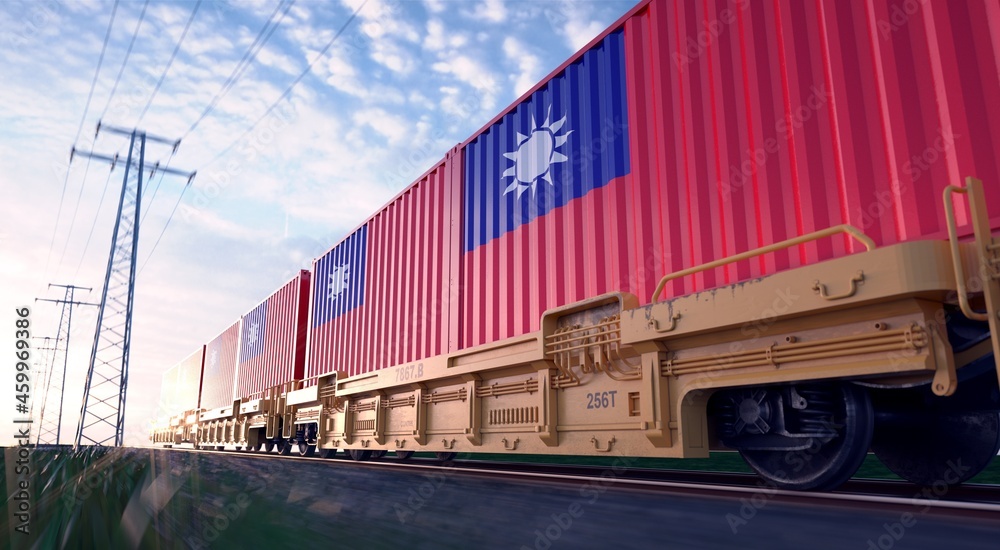 Taiwanese exports. Freight train with loaded containers in motion. 