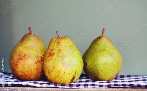 Organic Pears on a Green Backgound